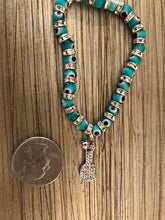 Load image into Gallery viewer, Turquoise Lucky Pickleball Bracelet next to a quarter for size comparison
