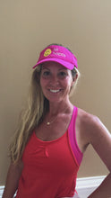 Load and play video in Gallery viewer, A video showing a woman wearing the pink Hit Happy Mesh Pickleball Visor