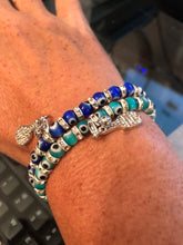 Load image into Gallery viewer, A woman wearing two Lucky Pickleball Bracelets