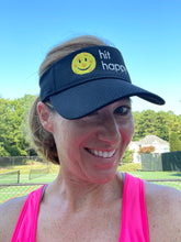 Load image into Gallery viewer, A woman wearing the black Hit Happy Mesh Pickleball Visor