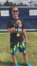 Load and play video in Gallery viewer, A video of a man wearing a black Hit Happy Pickleball Wristband