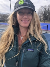 Load image into Gallery viewer, A woman wearing the Pickleball Paddle Pendant Necklace on the court