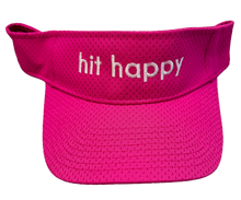 Load image into Gallery viewer, A bright pink mesh visor with the phrase 'hit happy' embroidered in white across the front band, shown against a plain white background.
