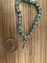Load image into Gallery viewer, Turquoise Lucky Pickleball Bracelet next to a quarter for size comparison
